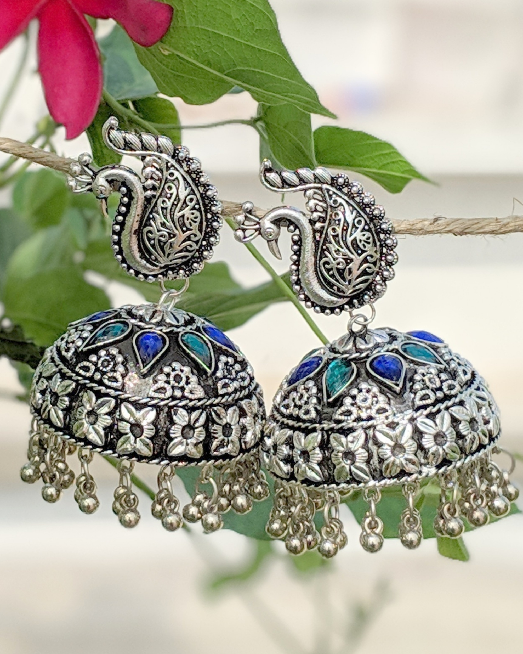 Silver peacock bell jhumkas